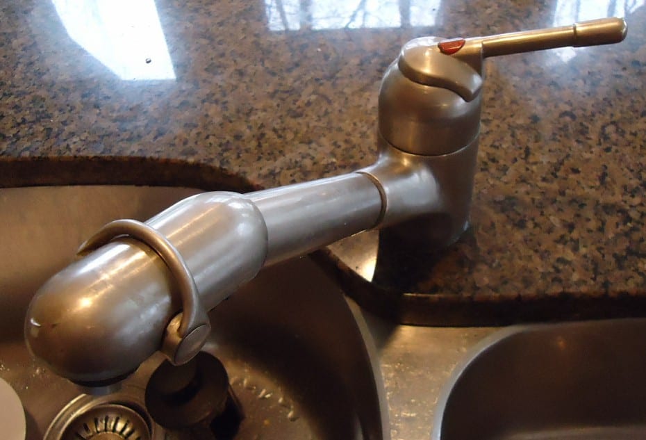 Kitchen faucet at a household sink